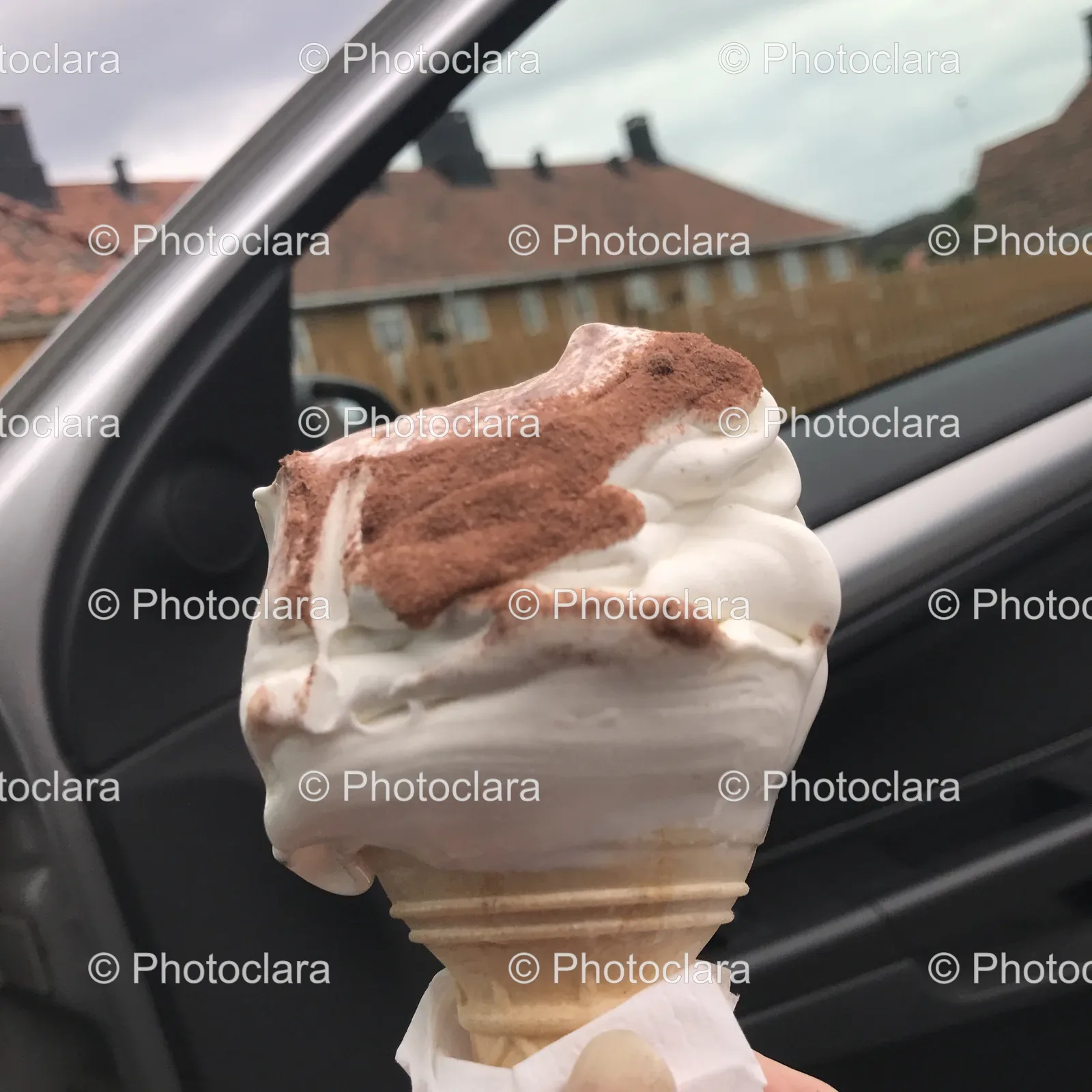 Hand-Holding-An-Ice-Cream-Cone.jpg