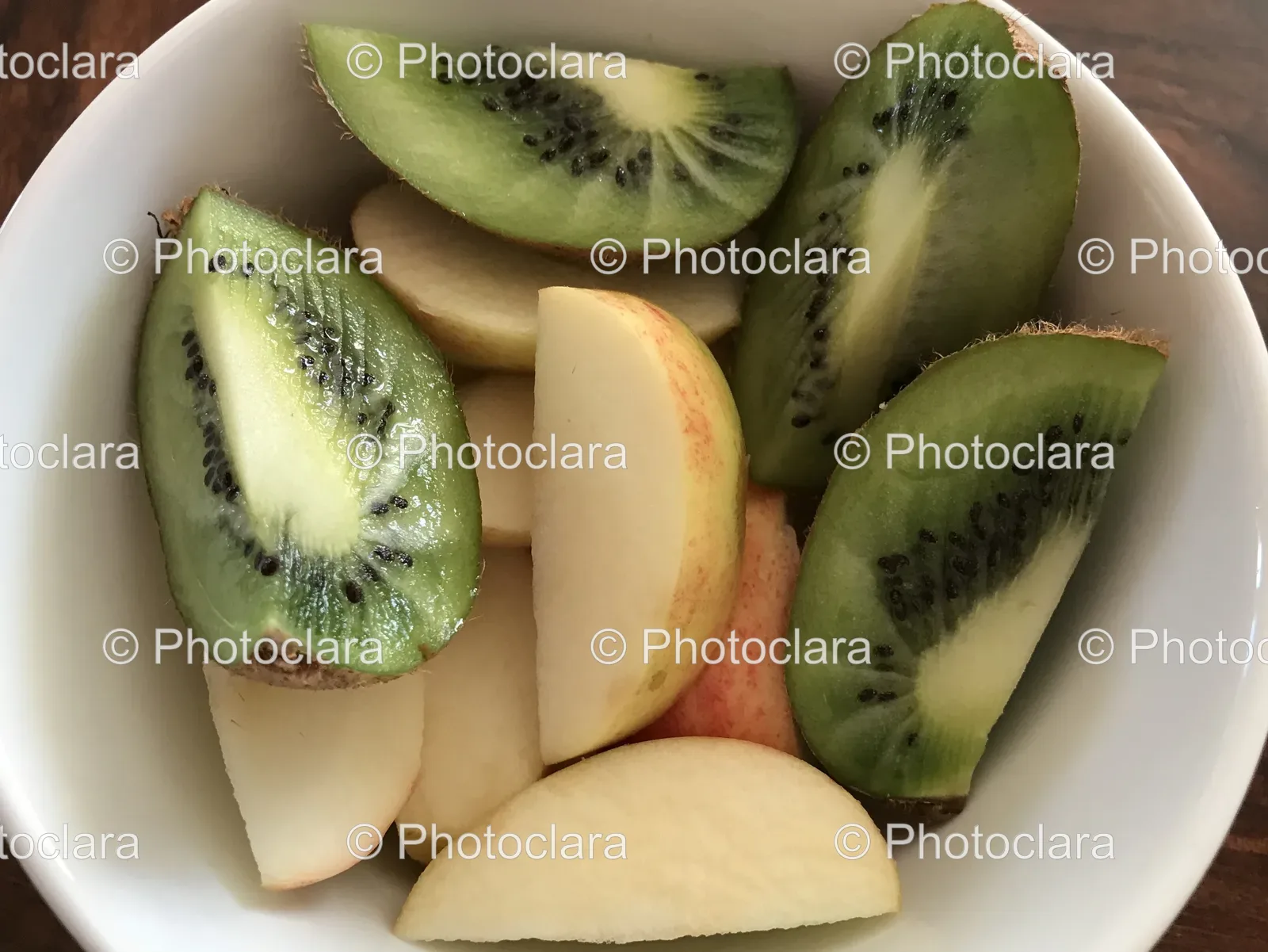bowl-of-fresh-kiwi-slices-and-fruits.jpg
