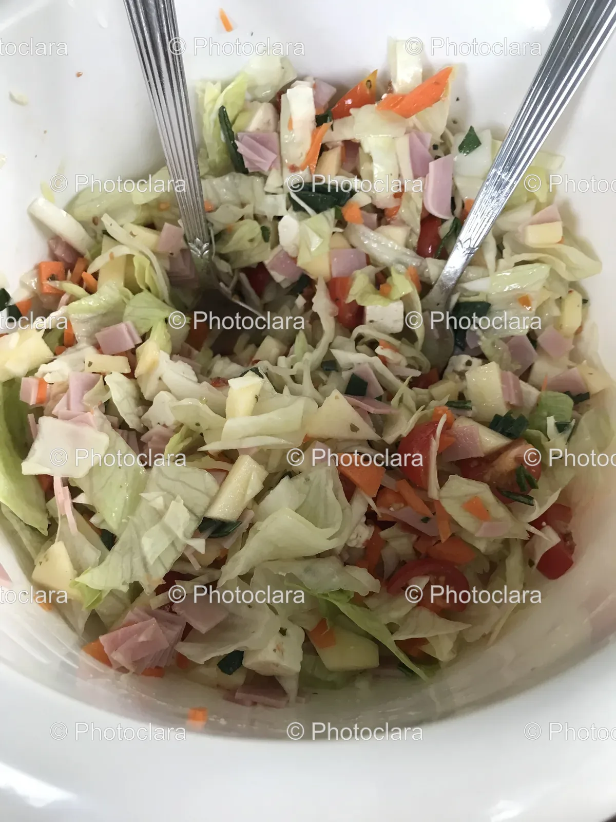 Bowl of Fresh Salad with Forks