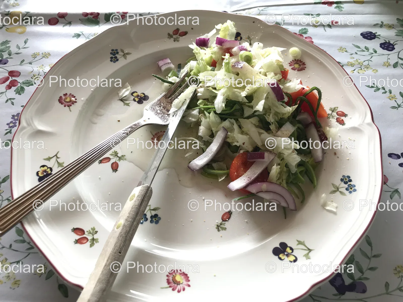 Fresh Salad with Utensils