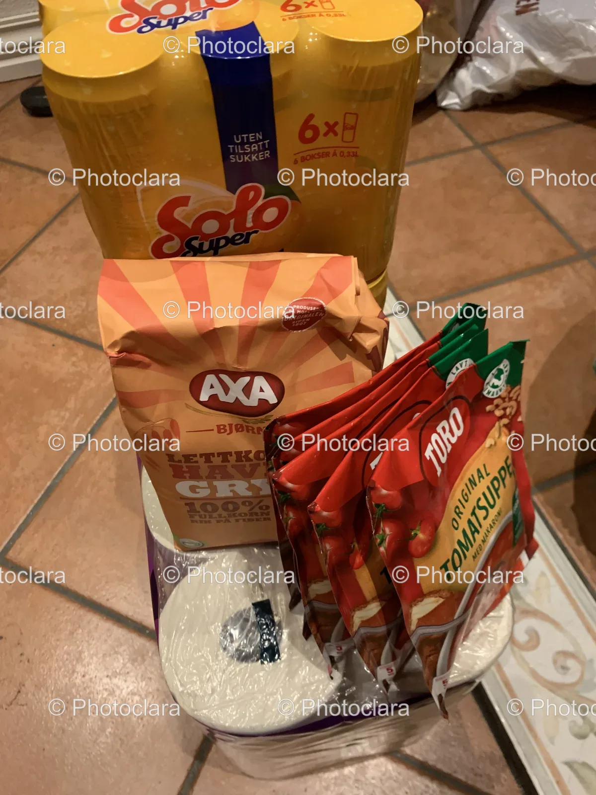 Group-of-Packaged-Foods-and-Soft-Drinks-on-Tile-Surface.jpg
