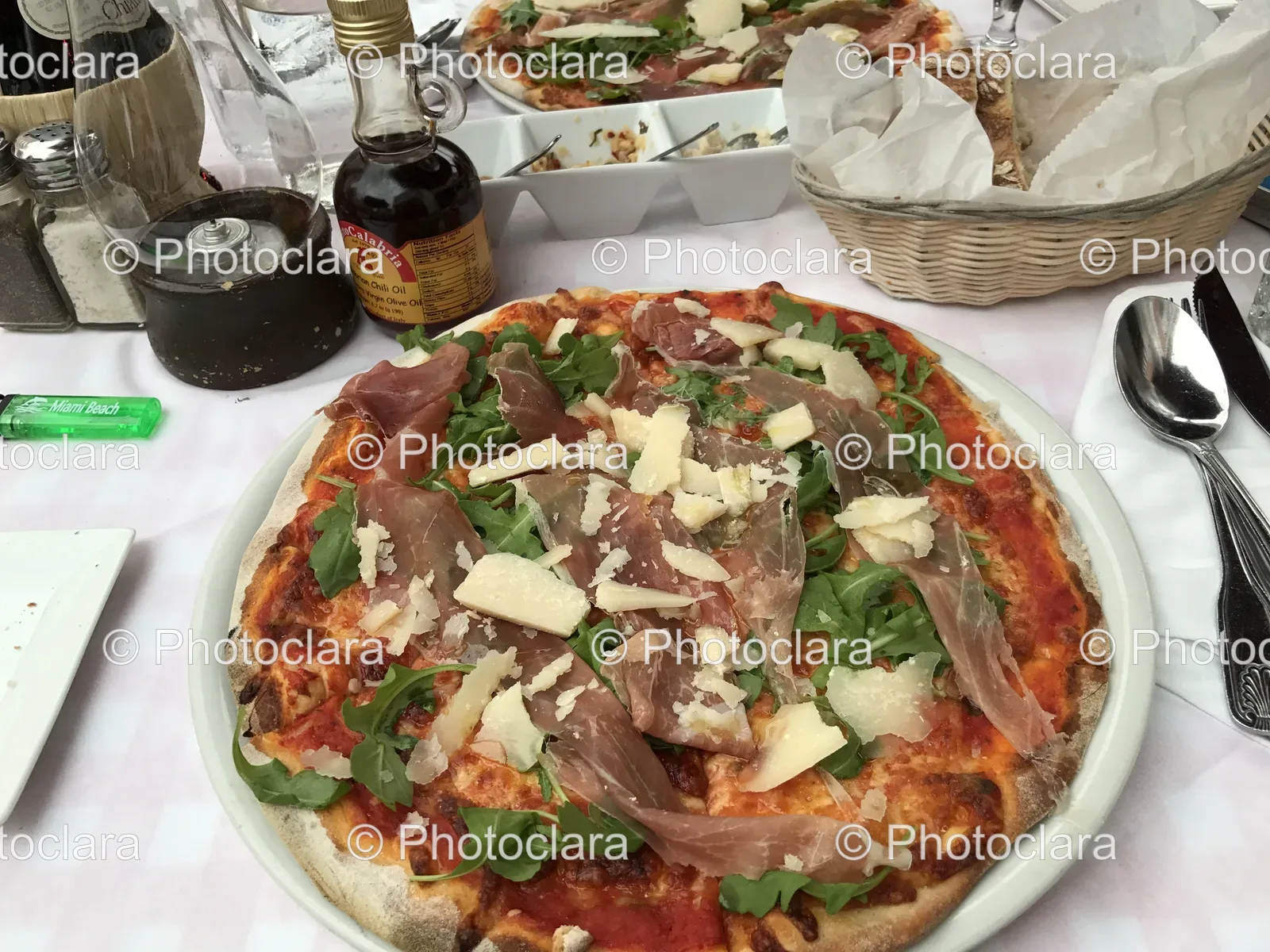 Delicious-Meat-Cheese-Pizza-on-Table.jpg