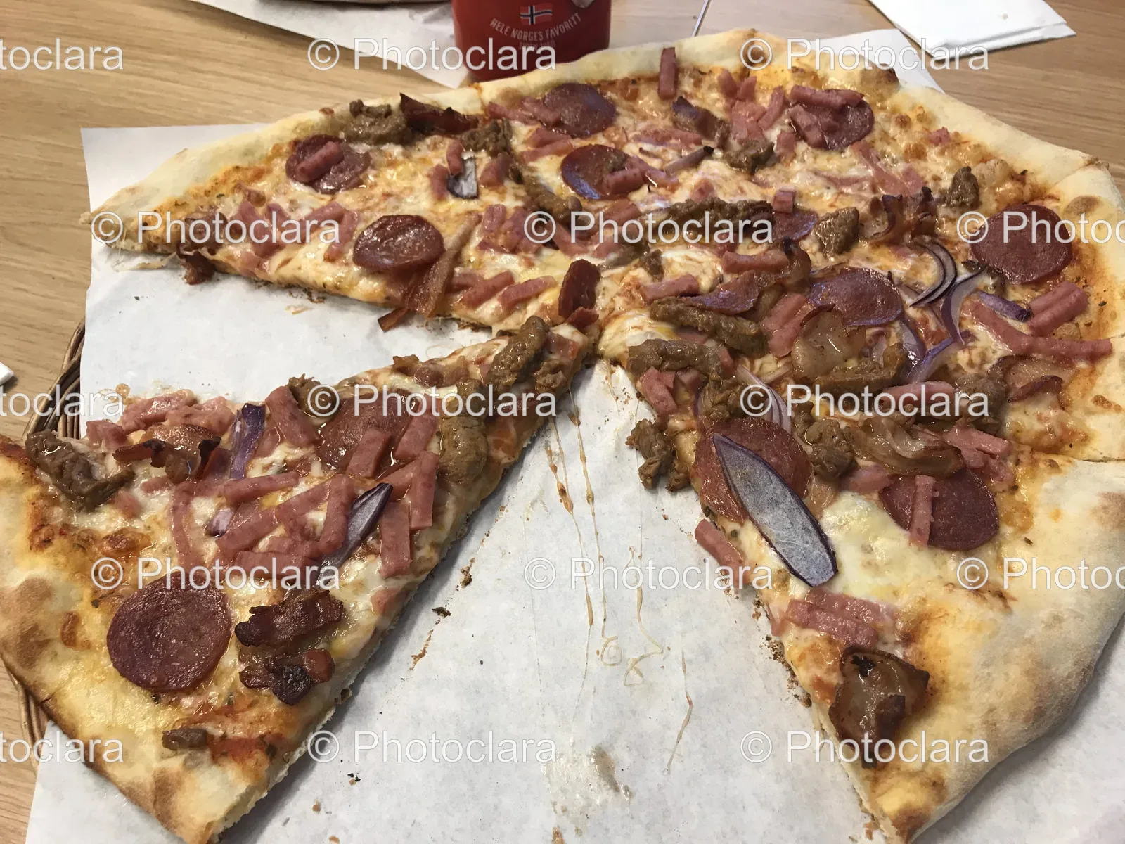 delicious-meat-sausage-pizza-on-paper.jpg