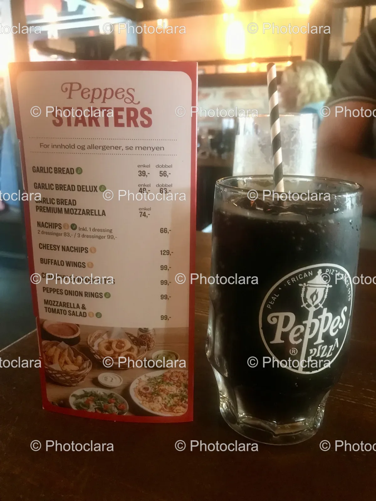 menu-and-glass-of-drink-at-peppes-pizza.jpg