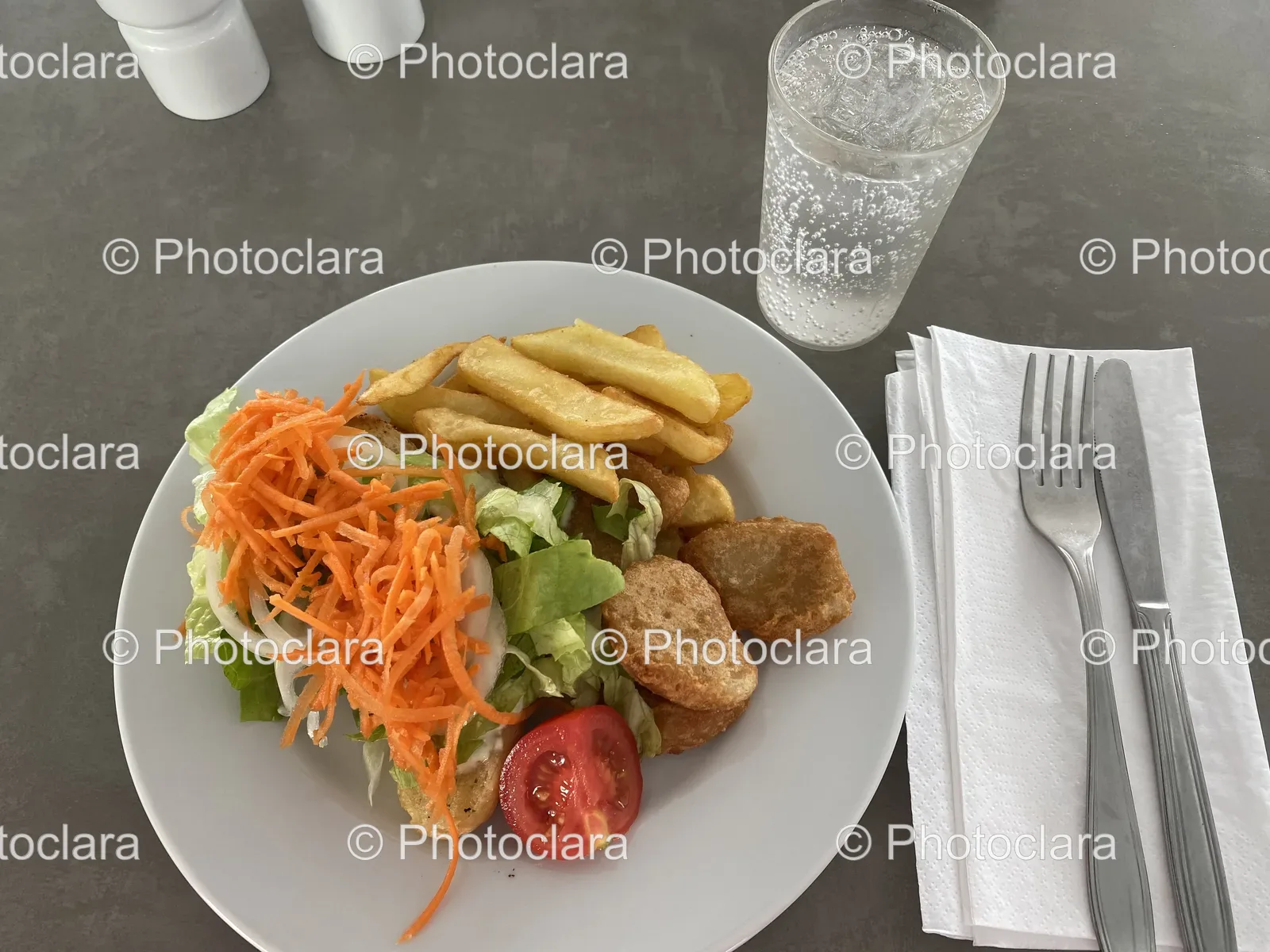 delicious-plated-meal-with-glass-of-water.jpg