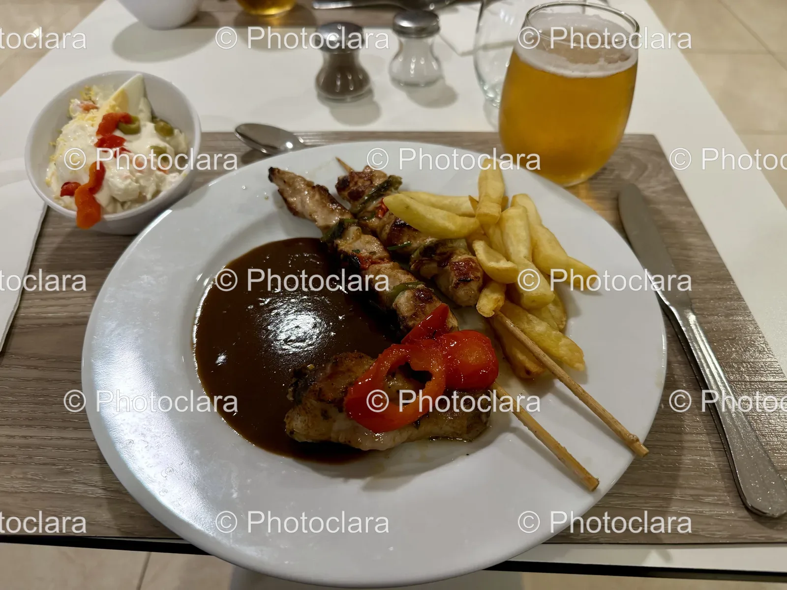 Exquisite-Plated-Dish-on-Wooden-Table.jpg