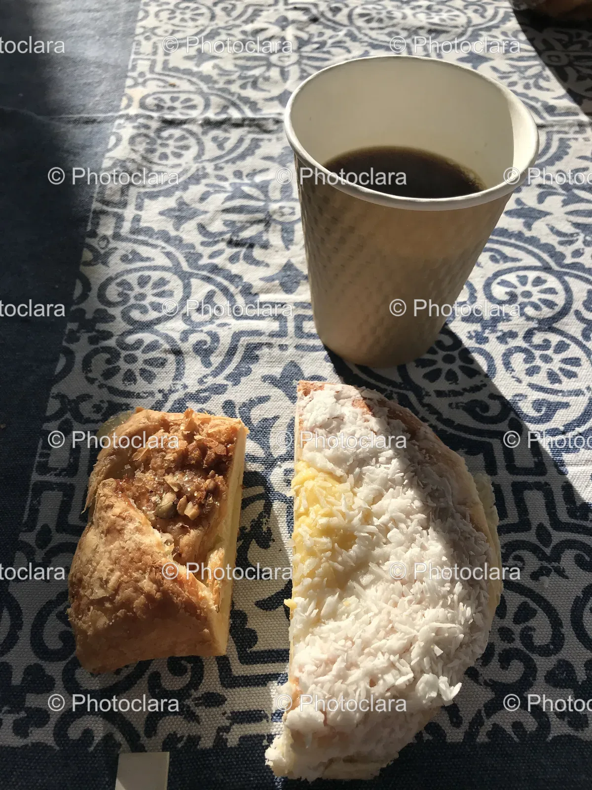 cup-of-coffee-and-pastries-on-table.jpg