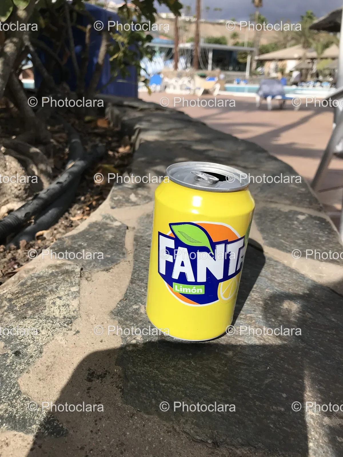 Refreshing-Yellow-Can-of-Fanta-on-Rock.jpg