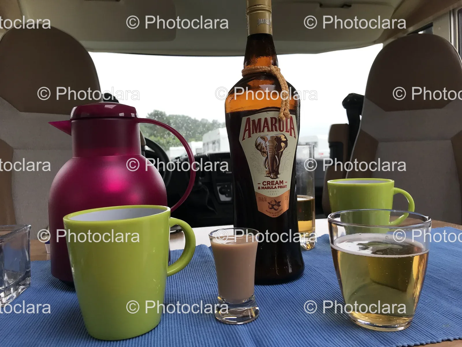 Bottle-of-Amarula-Liquor-with-Cups-on-a-Table.jpg