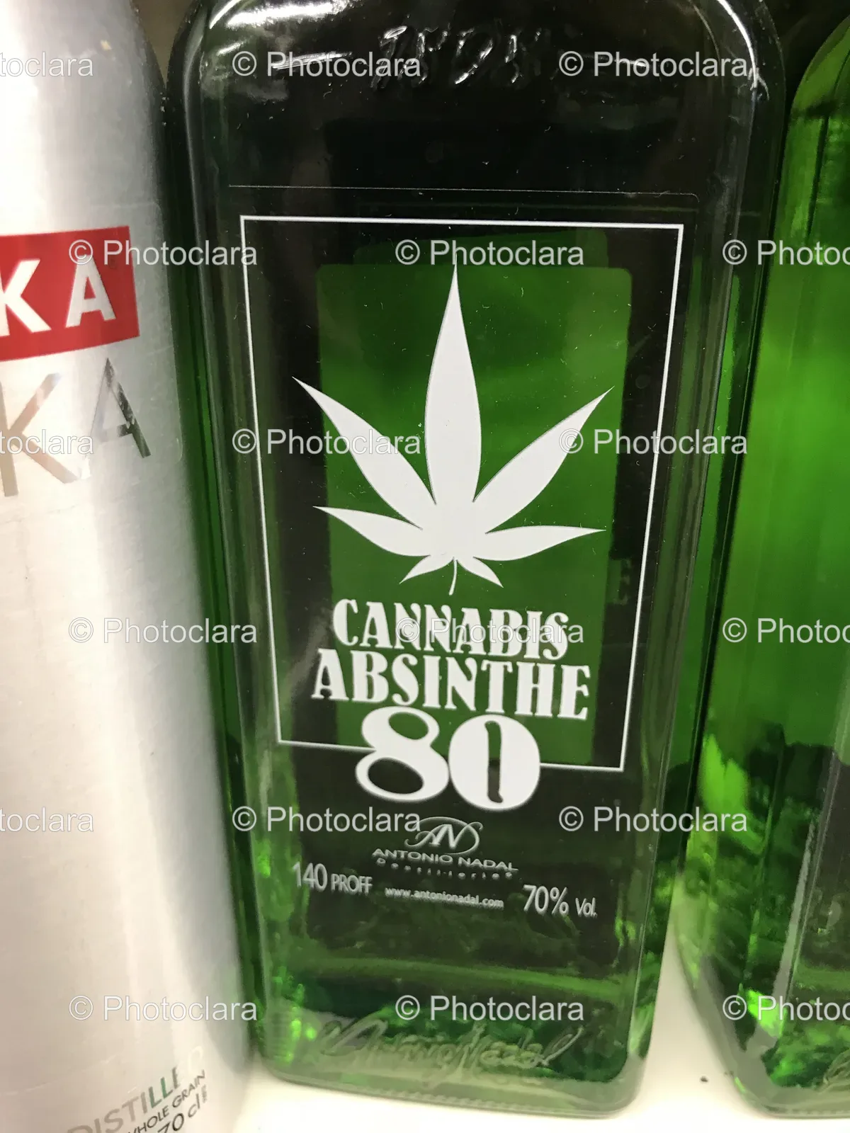 Green-Bottle-With-Leaf-Design.jpg