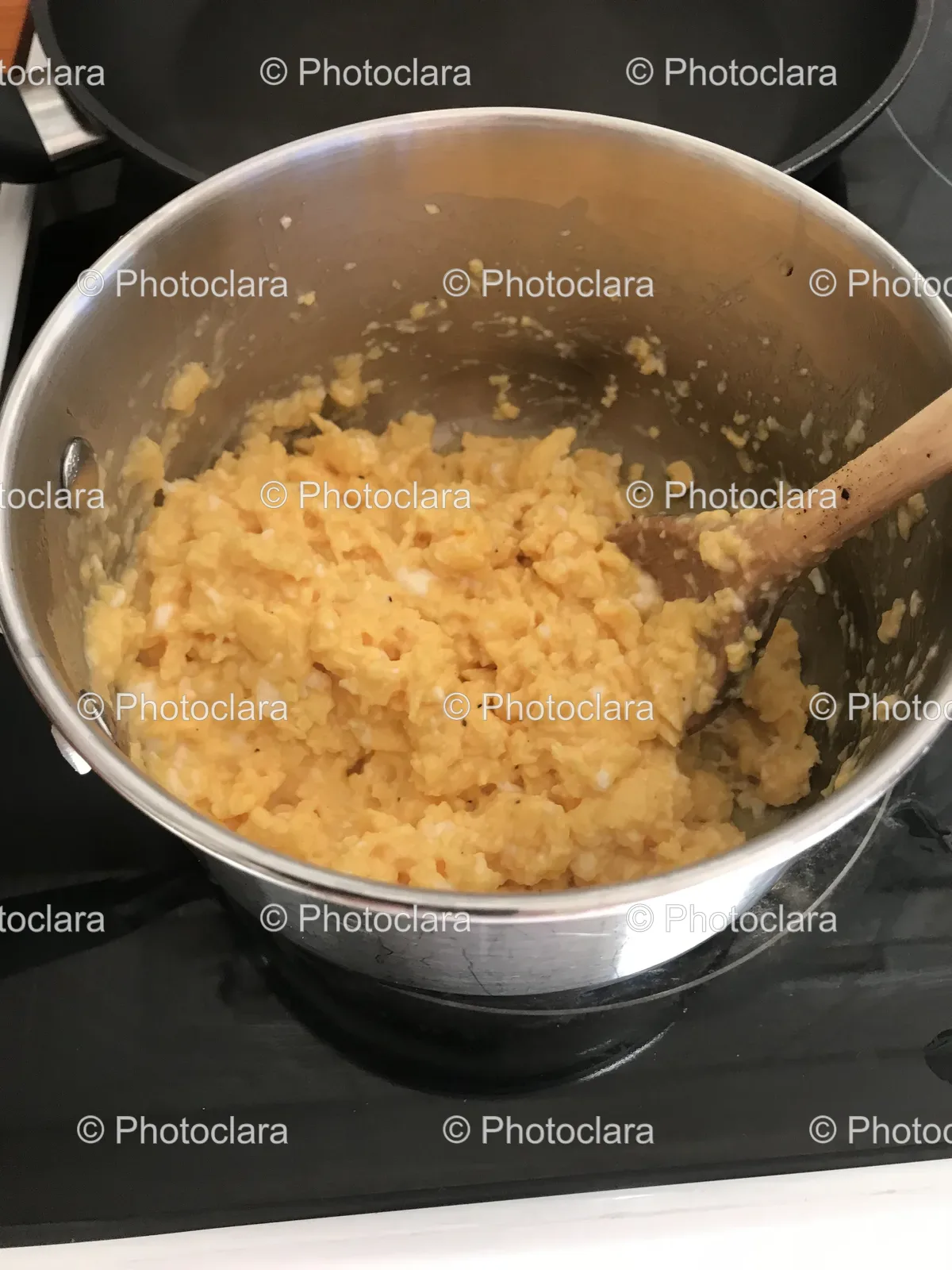 scrambled-eggs-in-a-bowl-on-a-stove.jpg