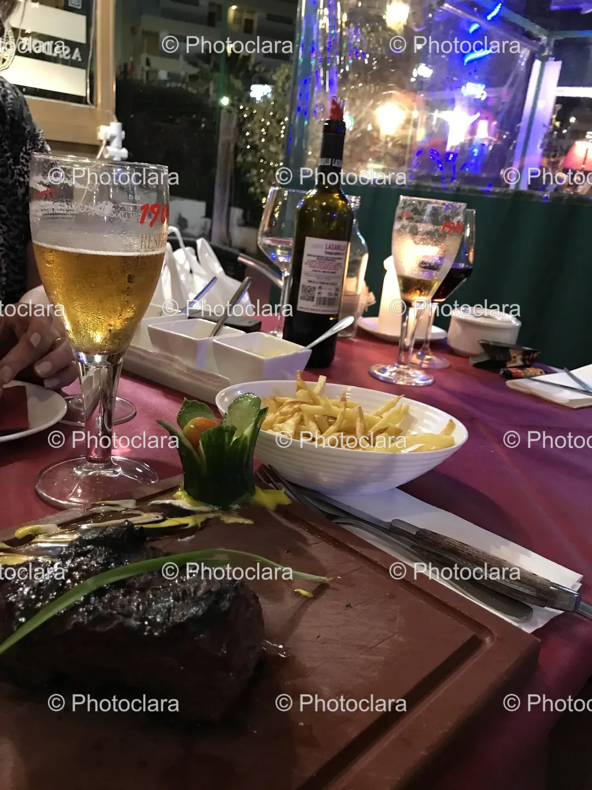 Elegant-Table-Setup-with-Food-and-Wine-Glasses.jpg
