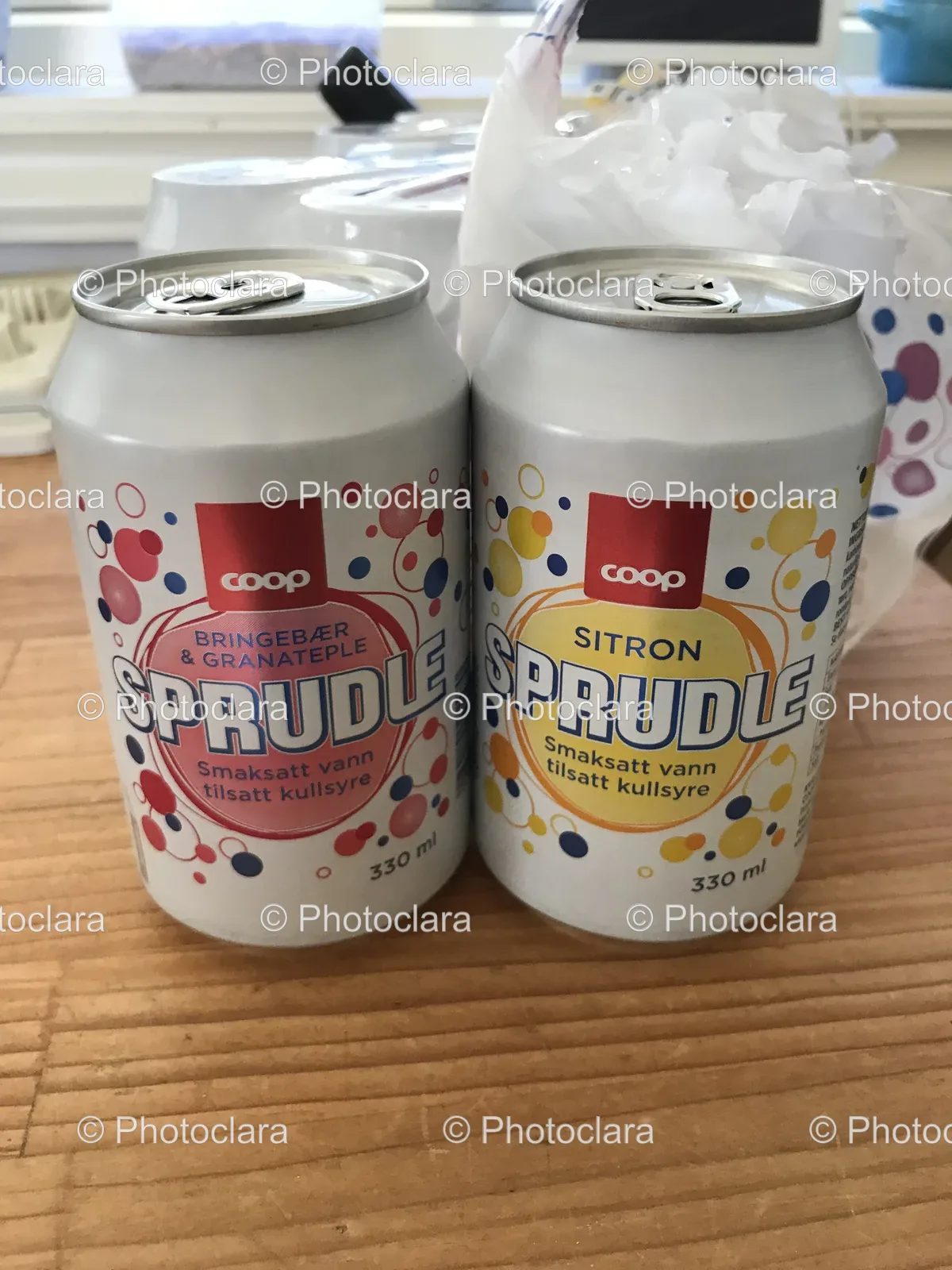 Two-Cans-of-Coop-Soda-on-Table.jpg