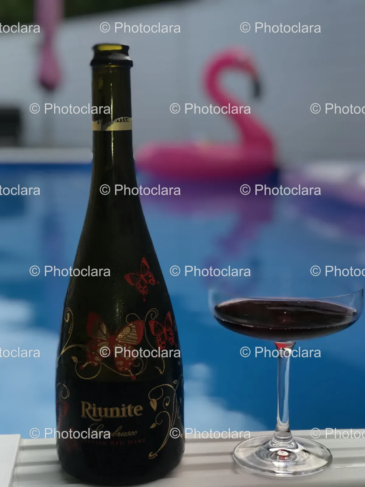 Bottle-of-Riunite-Lambrusco-Wine-with-a-Glass.jpg