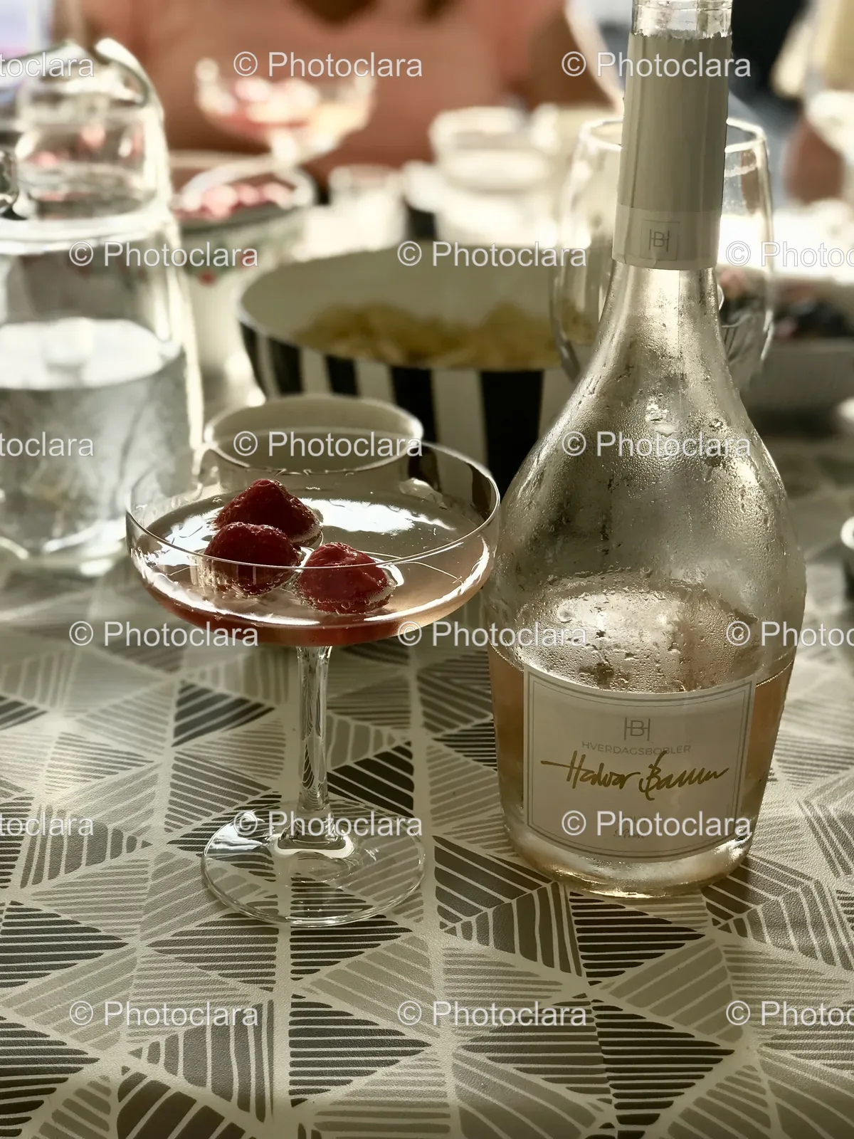 glass-of-wine-and-bottle-on-table.jpg