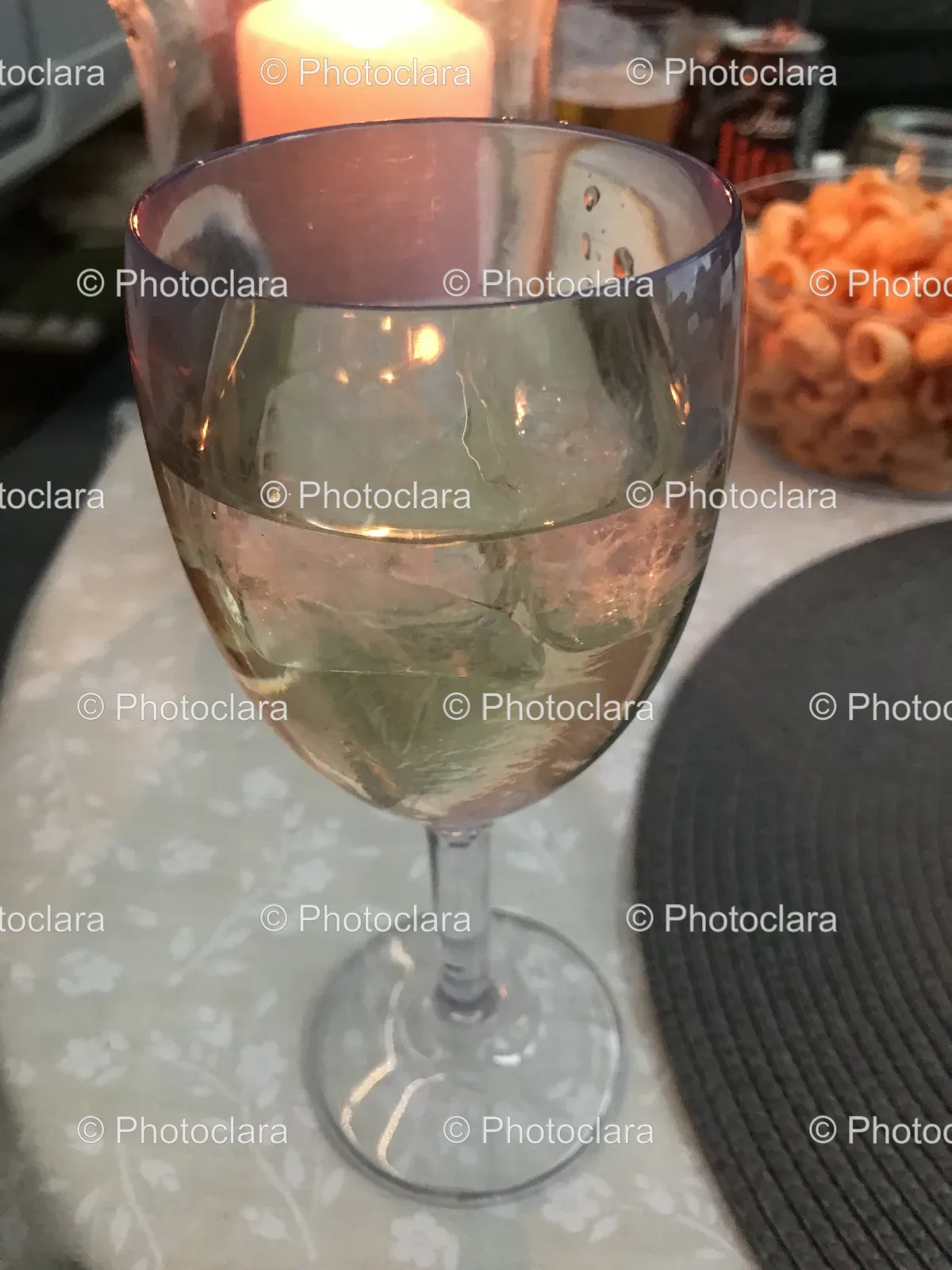 glass-of-wine-illumined-by-candlelight.jpg