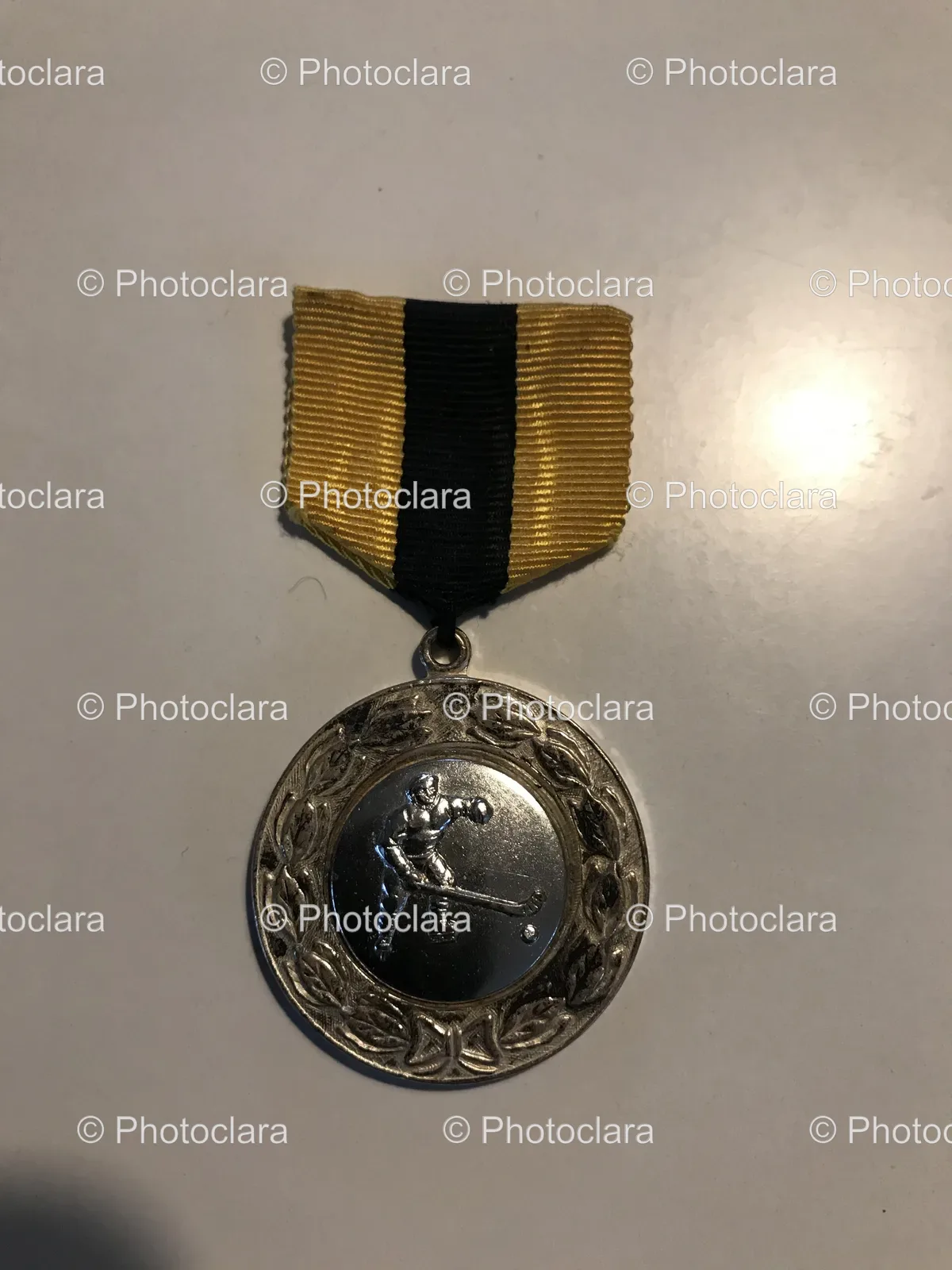 medal-with-black-and-yellow-ribbon.jpg