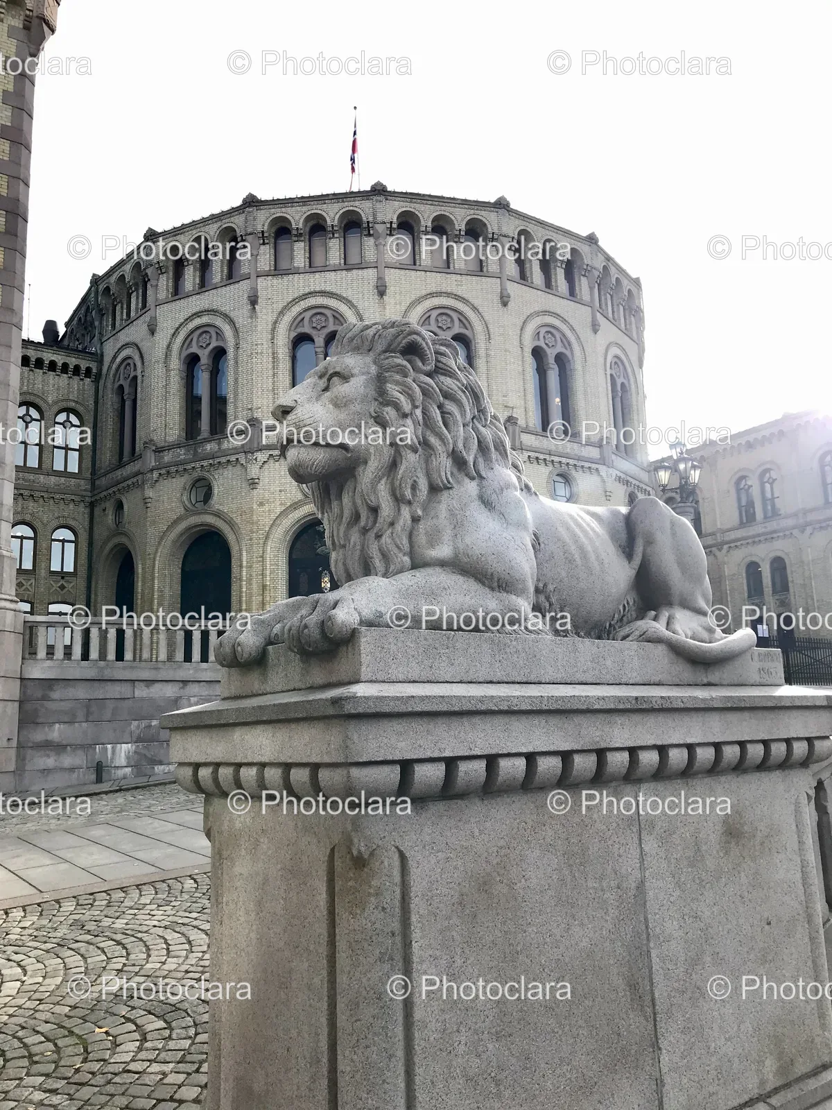 Stone-Lion-Statue-Front-Building.jpg