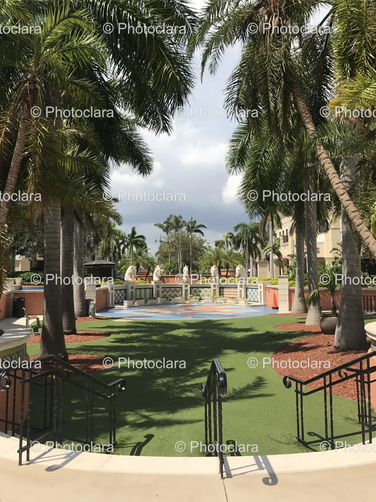 serene-courtyard-with-palm-trees-and-fountain.jpg