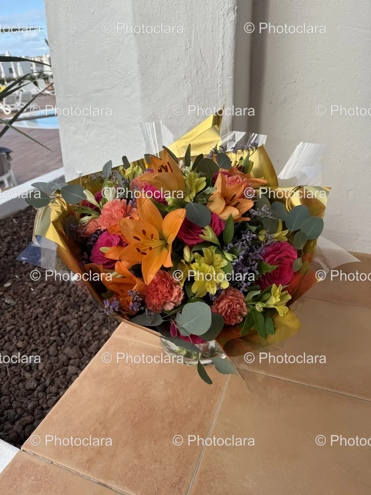 Elegant-Floral-Bouquet-on-Wooden-Table.jpg