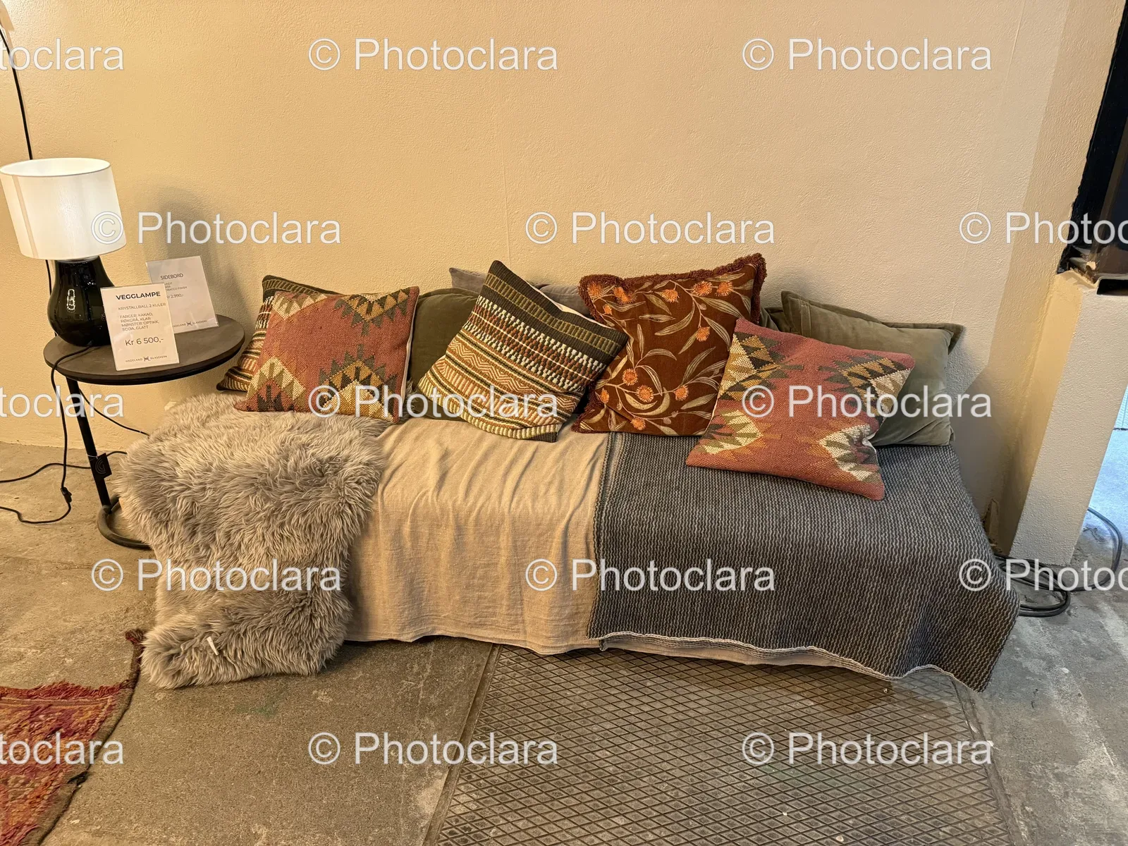 cozy-couch-with-pillows-and-designer-lamp.jpg