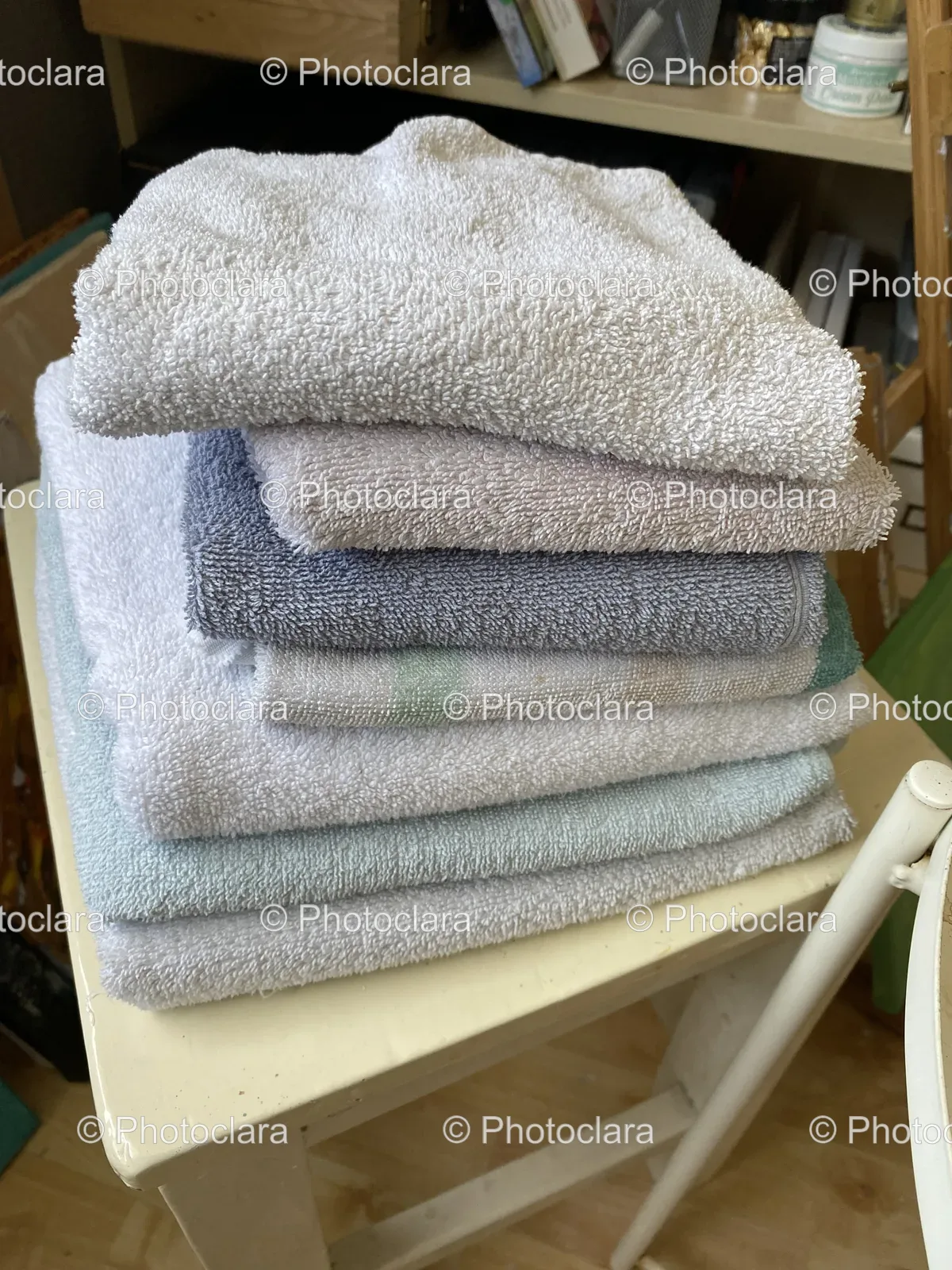 stack-of-towels-on-chair.jpg