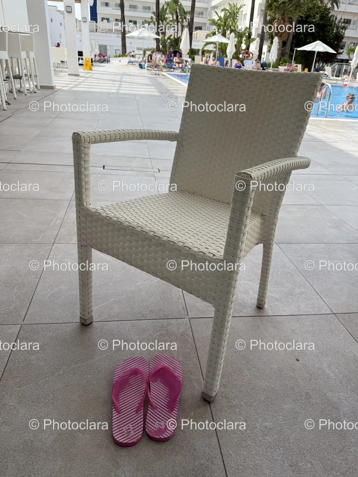 Cozy-Chair-and-Flip-Flops-on-Tile-Floor.jpg