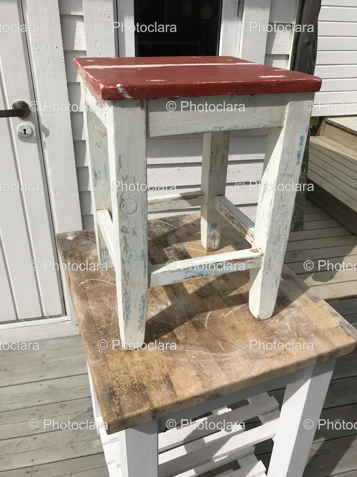 Stool-on-Wooden-Table-in-Outdoor-Setting.jpg