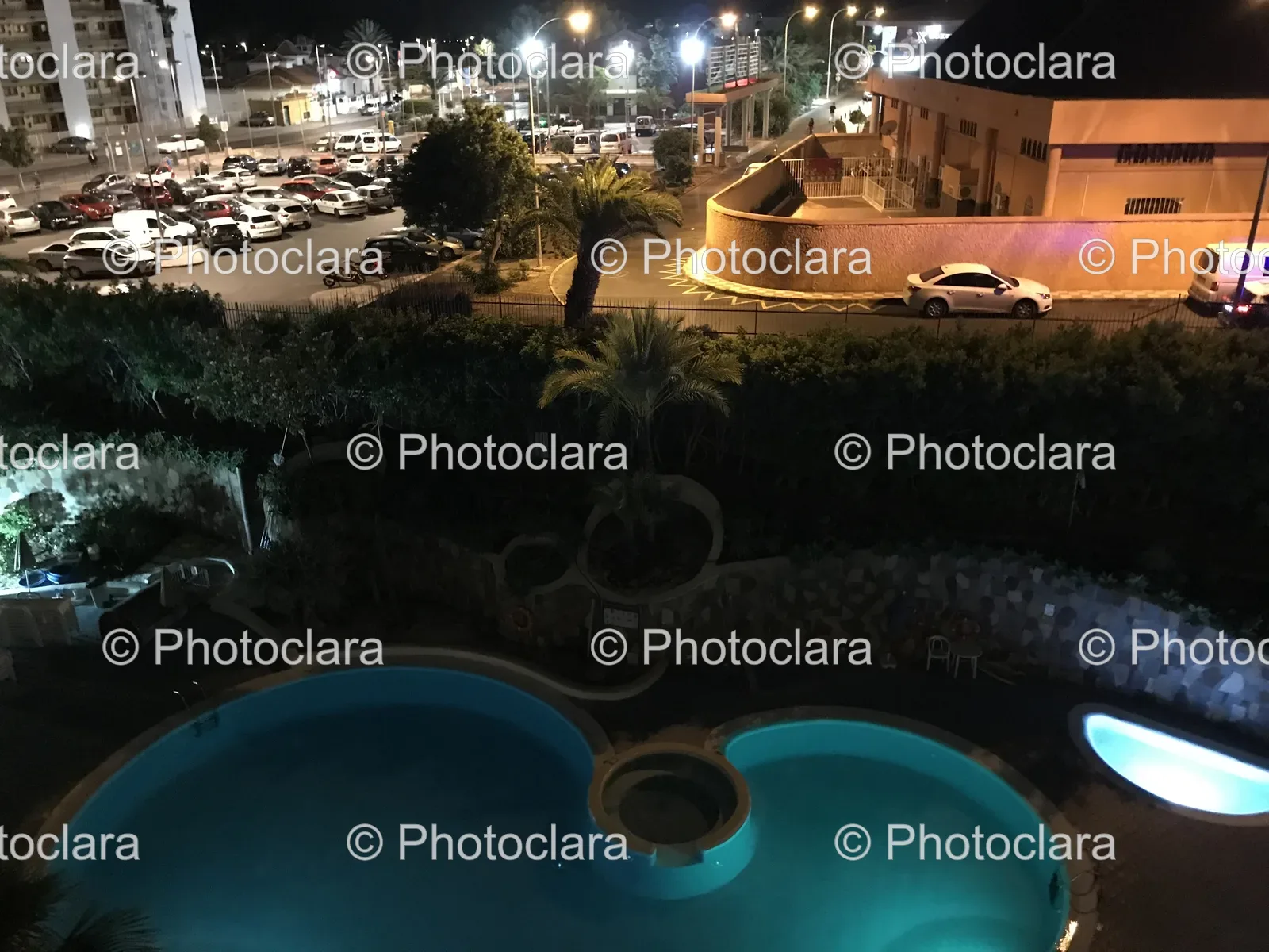Night-View-of-Pool-and-Parking-Lot.jpg