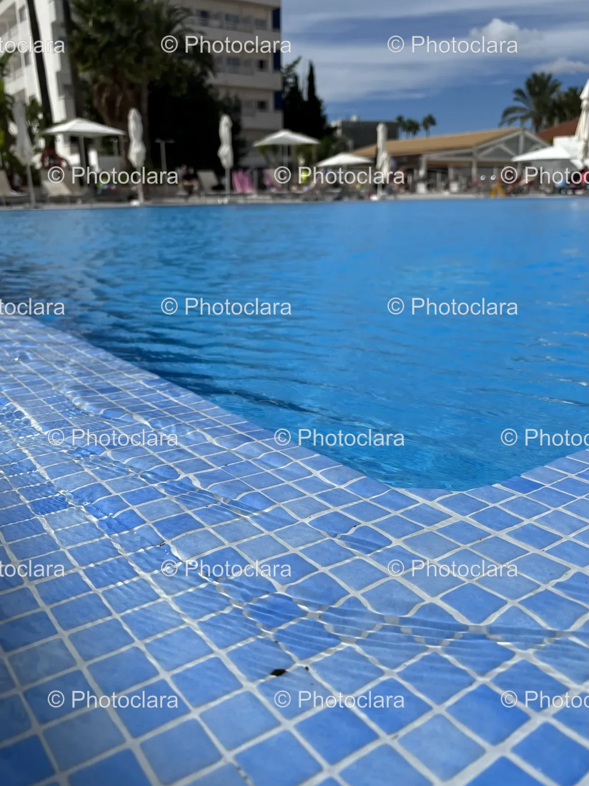 serene-outdoor-swimming-pool-azure-skies.jpg