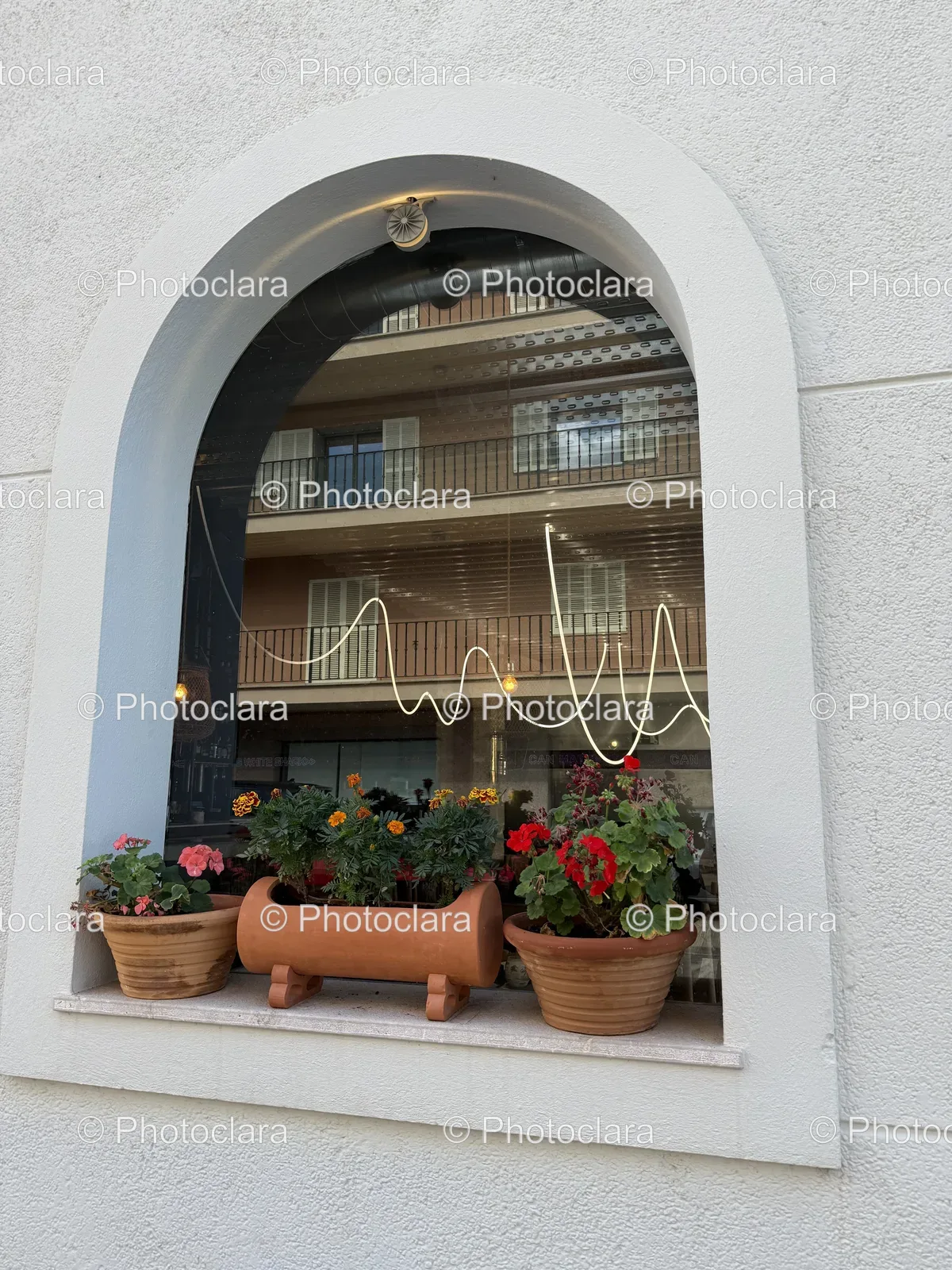 Charming-Window-with-Flower-Pots.jpg