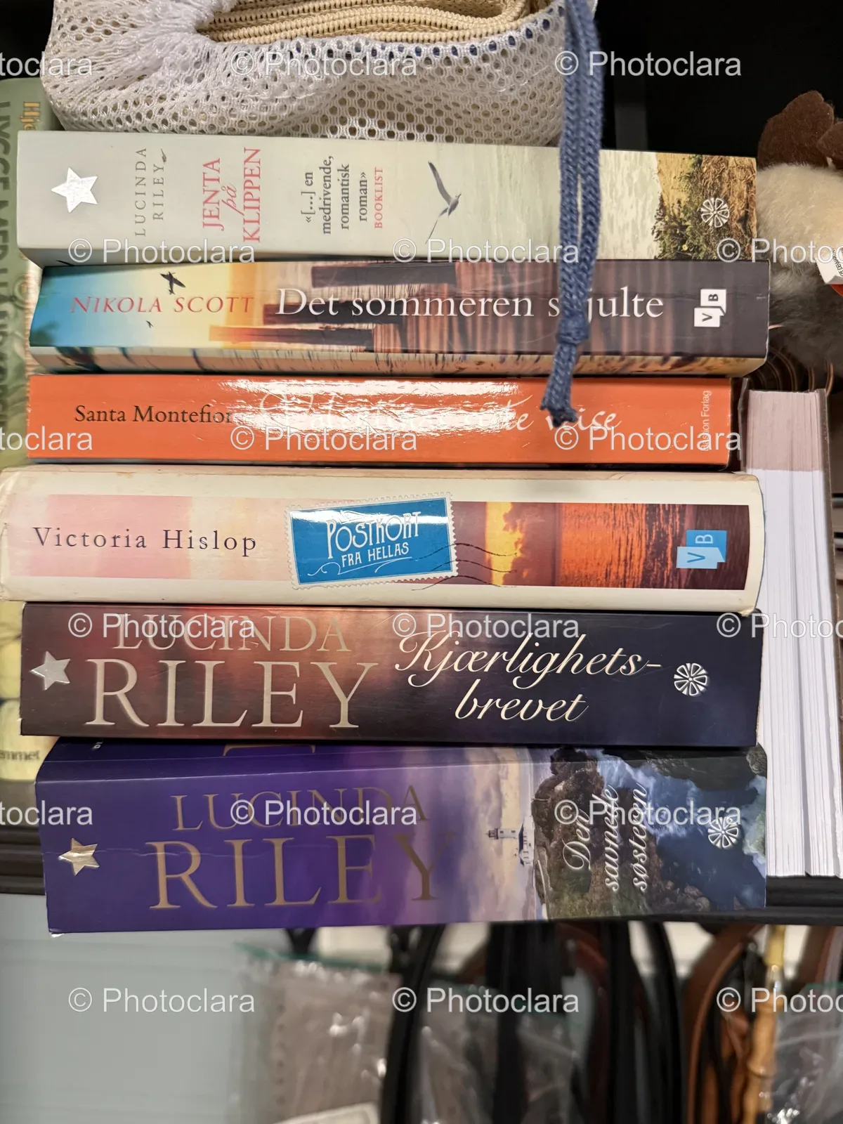 stack-of-books-on-a-shelf.jpg