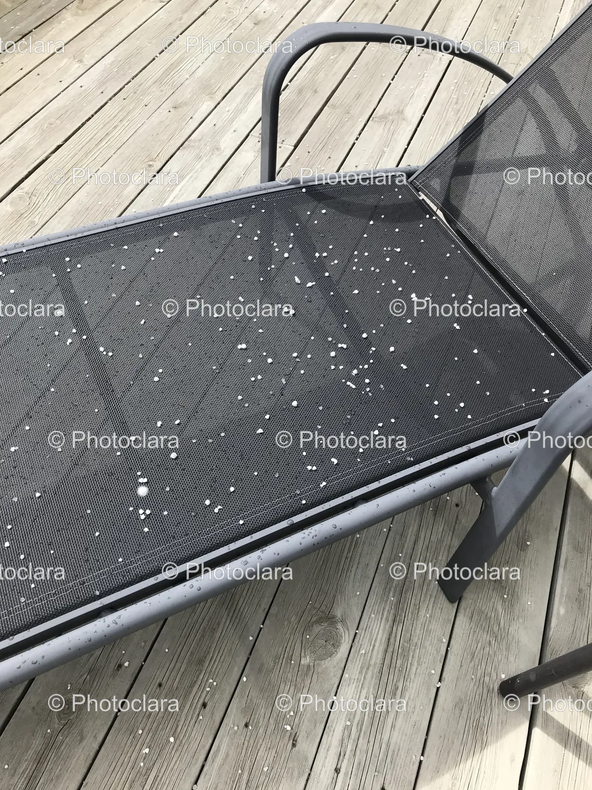 Metal-Chair-on-Wooden-Deck.jpg