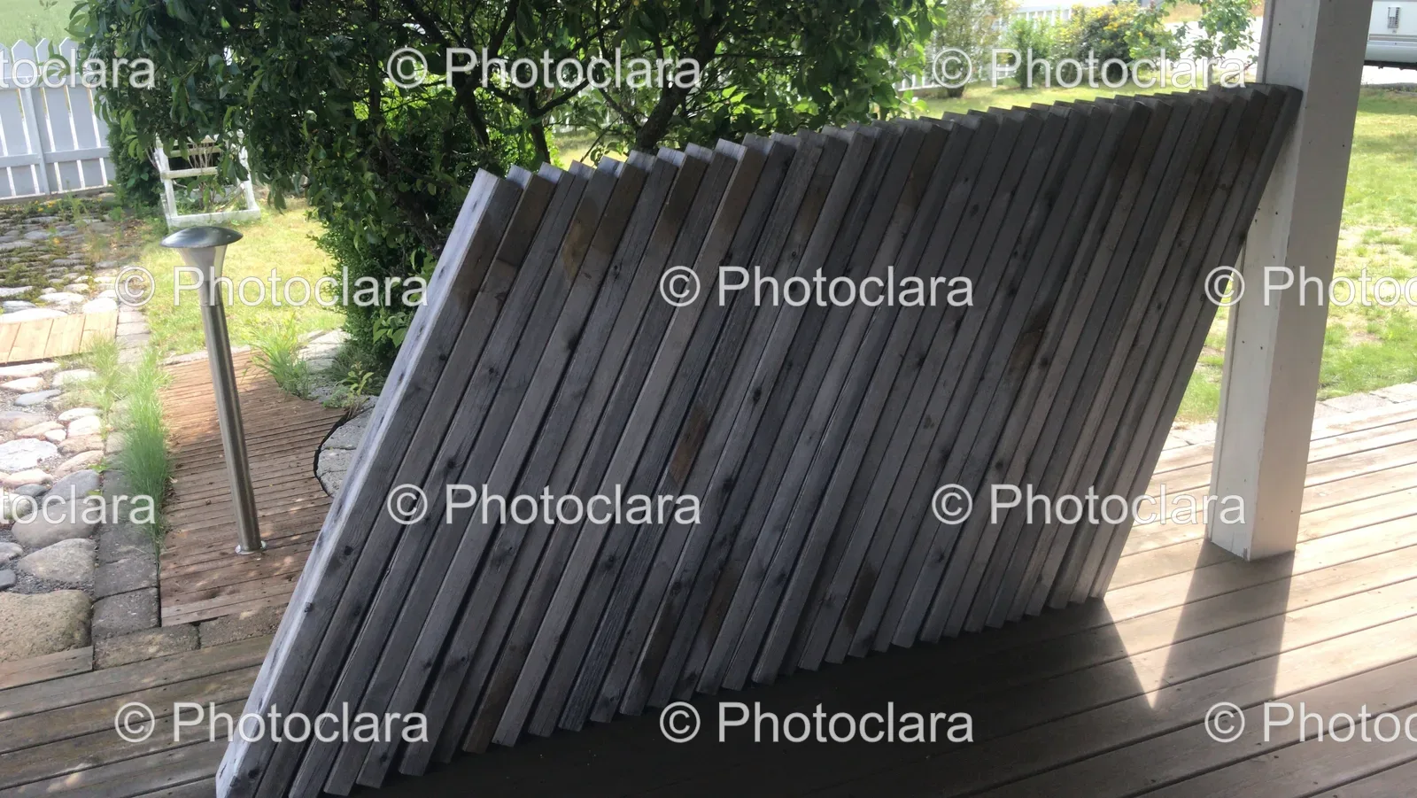 stack-of-wood-planks-on-a-deck.jpg