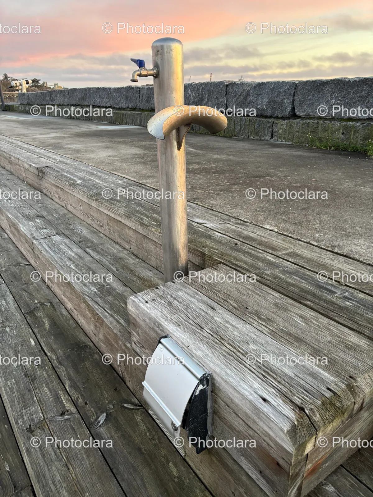 unique-outdoor-faucet-on-wooden-stairs.jpg