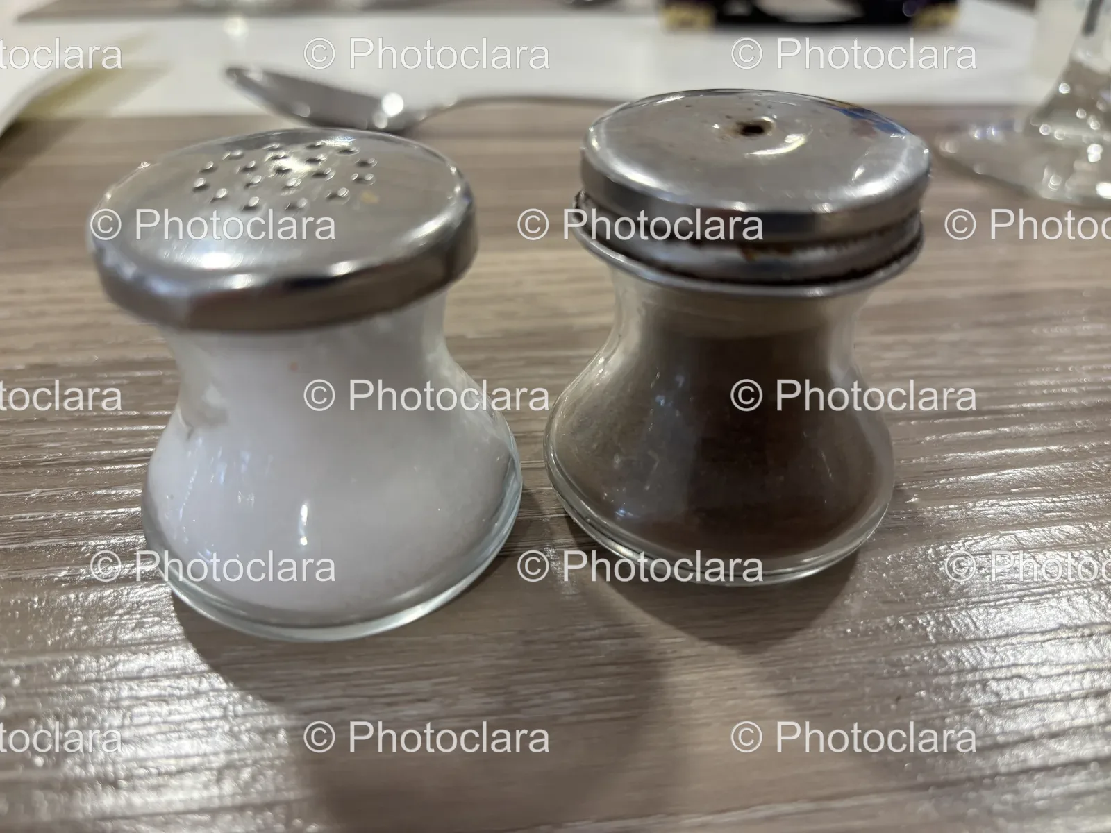 Salt-and-Pepper-Shakers-on-Table.jpg
