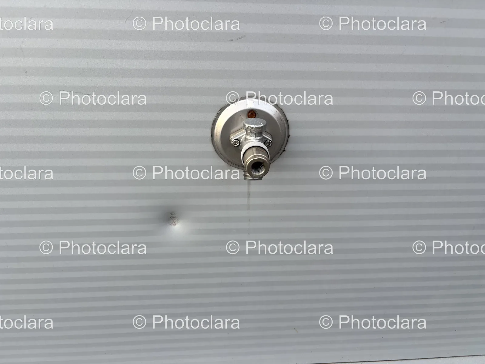 metal-spigot-on-white-surface.jpg