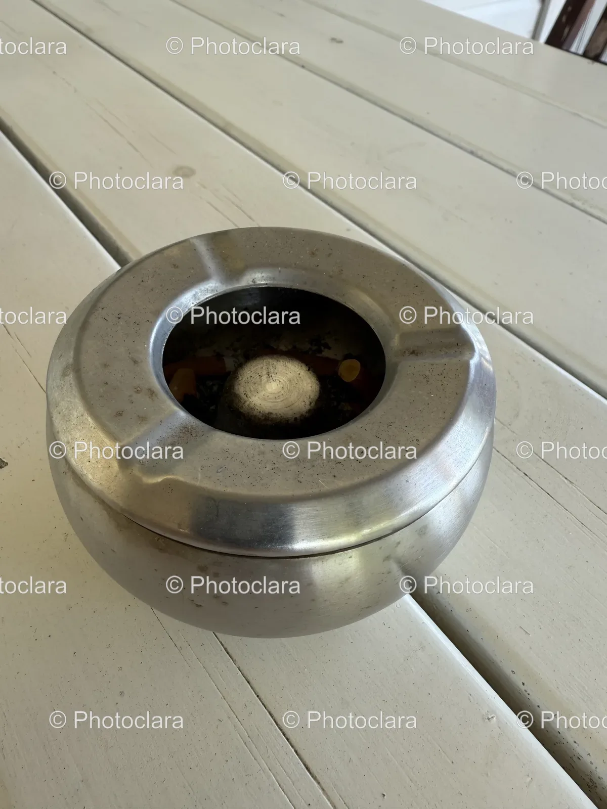 Elegant-Metal-Ashtray-on-Table.jpg
