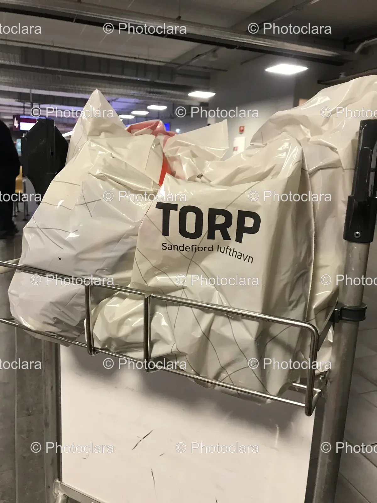 White-Bags-in-Metal-Rack.jpg