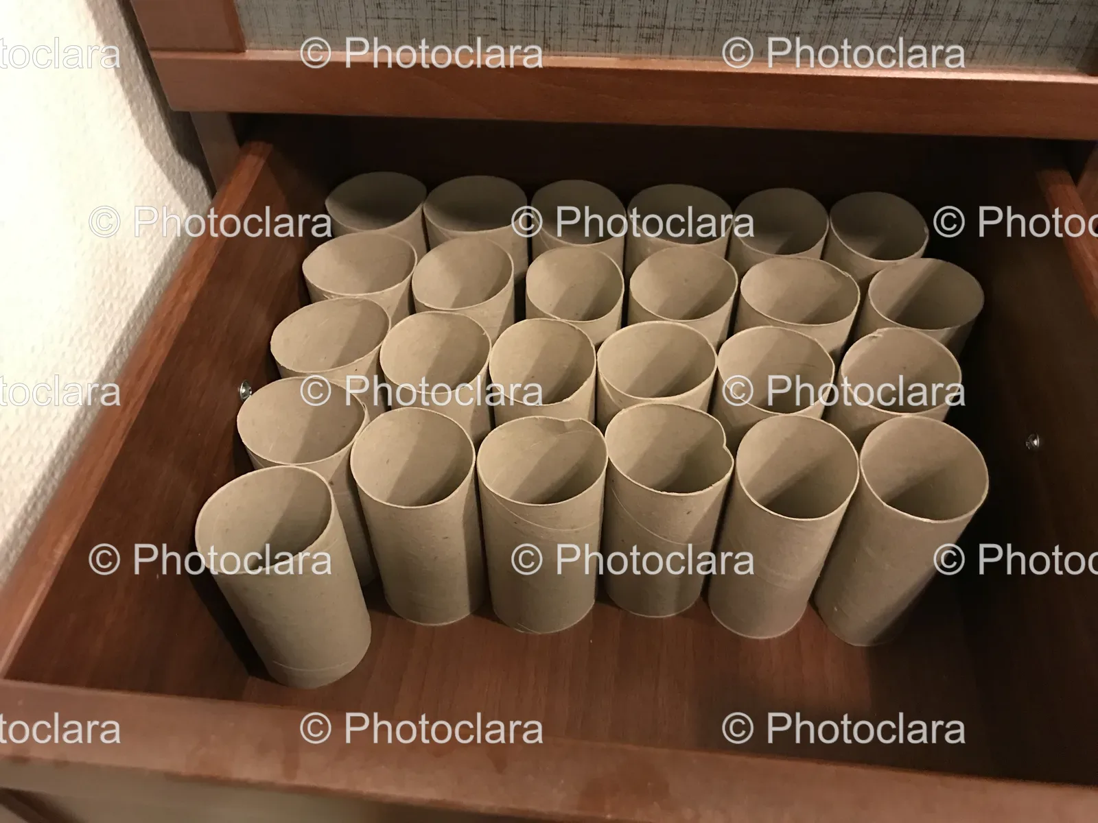 Toilet-Paper-Rolls-in-a-Wooden-Drawer.jpg