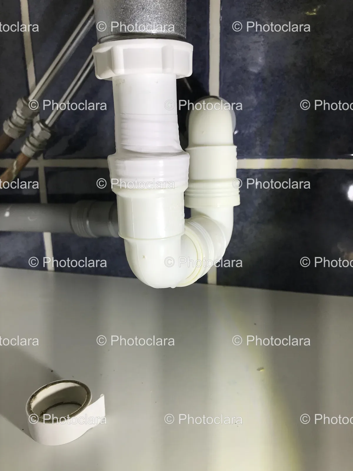 White-Pipe-On-Tile-Wall.jpg
