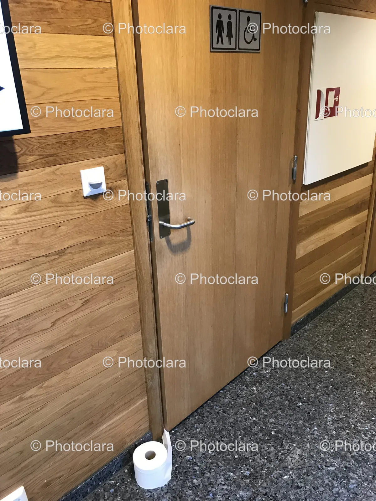 wooden-door-handle-in-bathroom.jpg