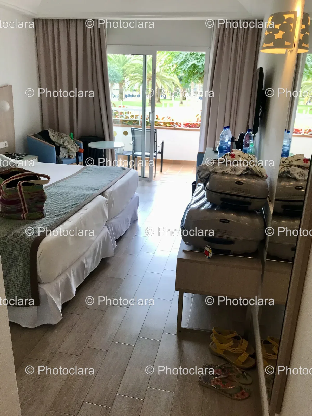 Cozy-Bedroom-with-Bed-and-Luggage.jpg