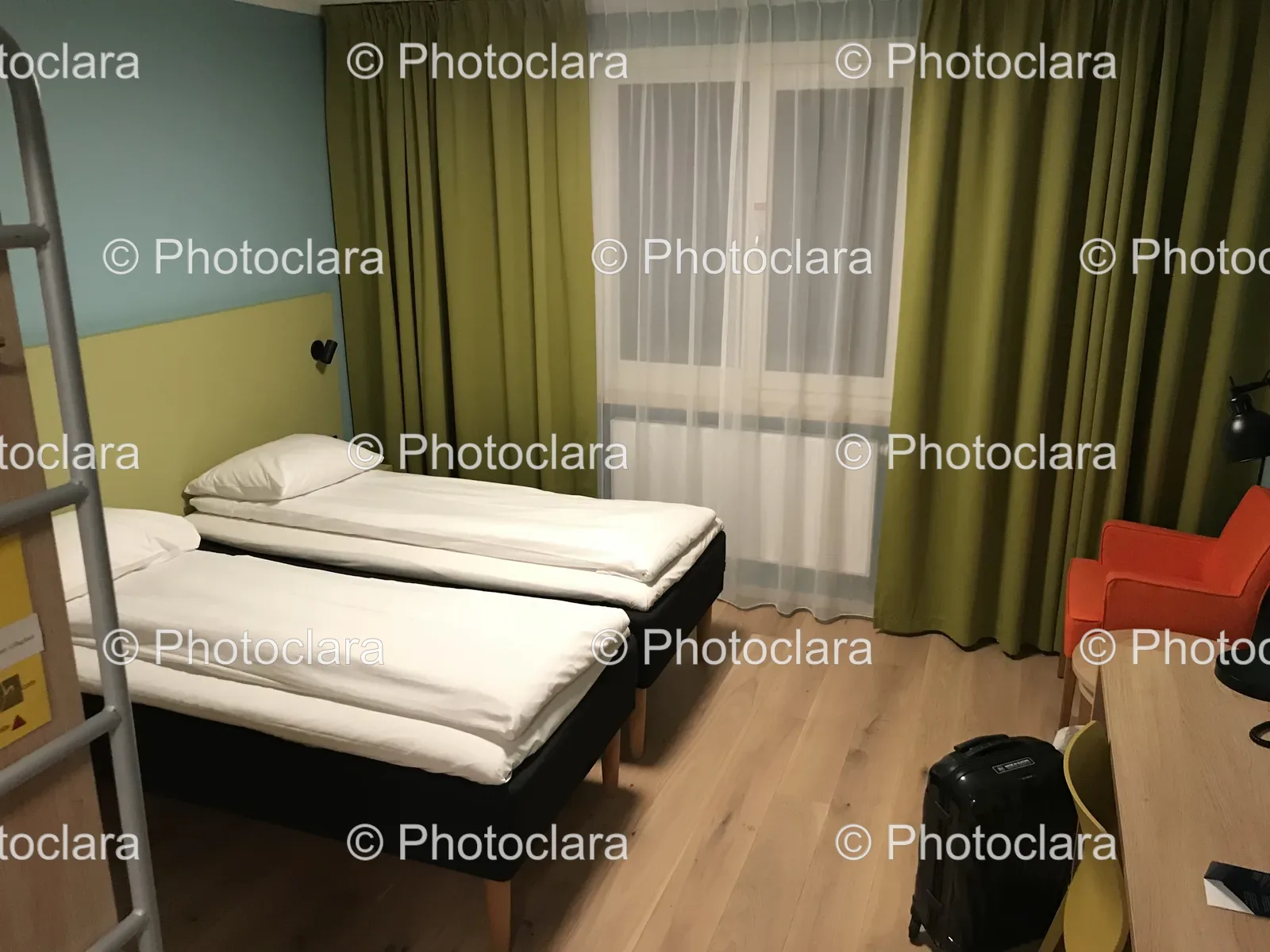 cozy-twin-beds-light-filled-bedroom.jpg
