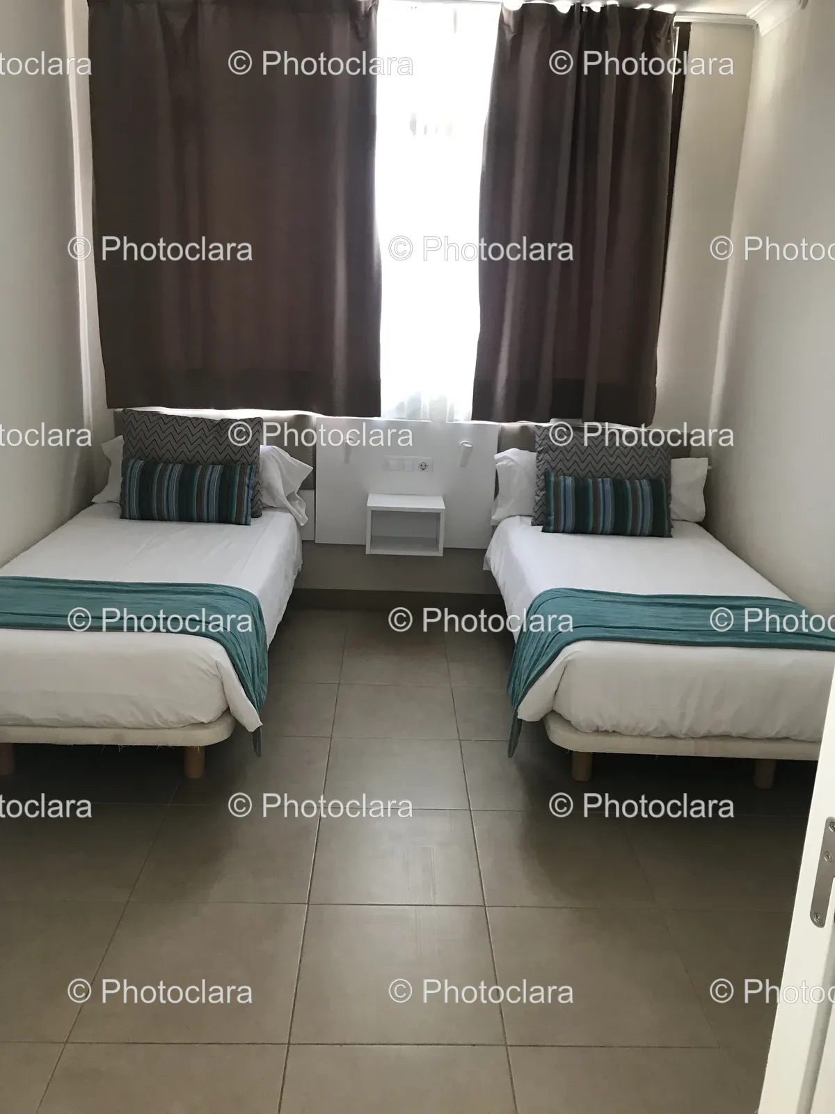 modern-hotel-room-two-beds.jpg