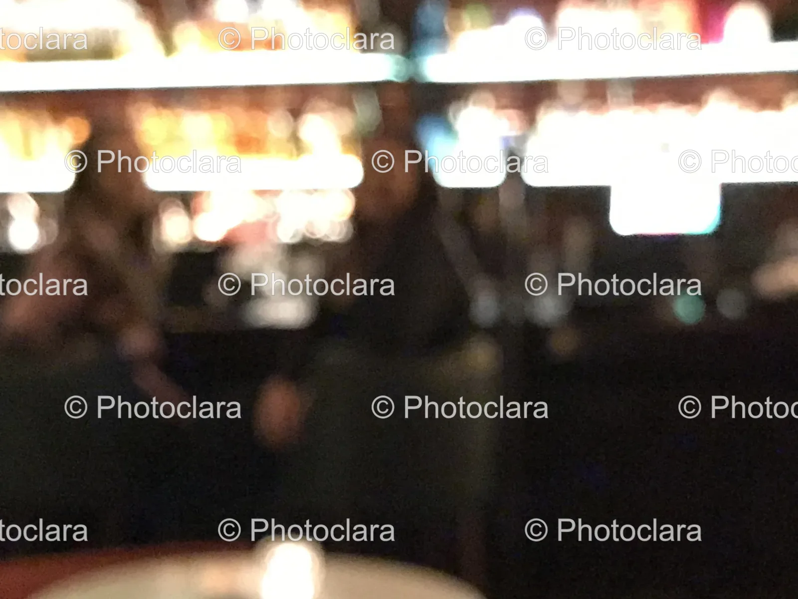 Blurry-Person-in-Candlelit-Restaurant.jpg