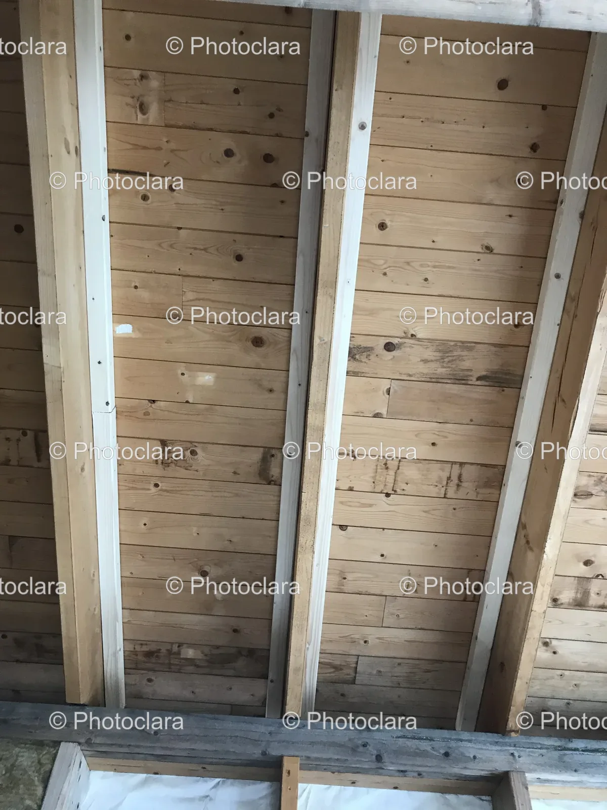 wood-ceiling-with-white-beams.jpg