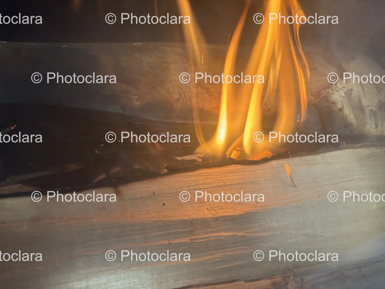 Cozy-Fire-Burning-in-a-Rustic-Fireplace.jpg