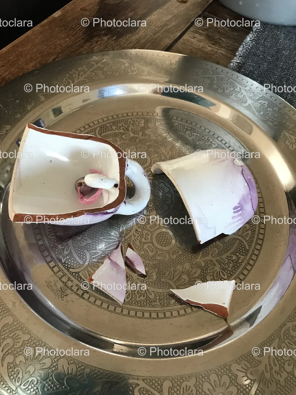 Broken-Cup-on-a-Plate.jpg