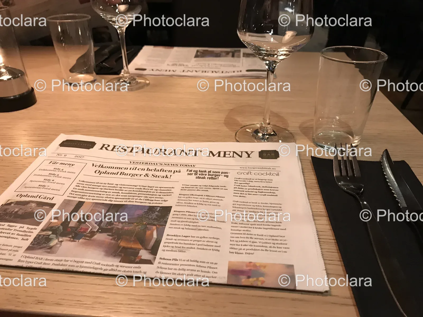 Newspaper-and-Glasses-on-Dining-Table.jpg